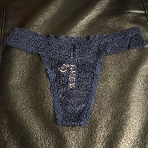 Victoria Secret Navy Lace Thong Size: Small Condition: New, tags attached!